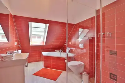 Ein Badezimmer in der Unterkunft Haus Bergstrasse 4 Haus Bergstraße 4 Appartement 9