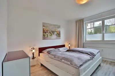 Ein Bett oder Betten in einem Zimmer der Unterkunft Haus Strandstrasse Strandstrasse 150 Appartement 2