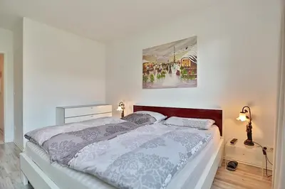 Ein Bett oder Betten in einem Zimmer der Unterkunft Haus Strandstrasse Strandstrasse 150 Appartement 2