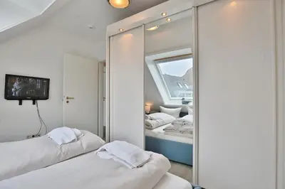 Ein Bett oder Betten in einem Zimmer der Unterkunft Maison Baltique Niendorf Maison Baltique Appartement 26