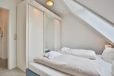 Ein Bett oder Betten in einem Zimmer der Unterkunft Maison Baltique Niendorf Maison Baltique Appartement 26