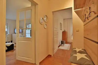 Ein Bett oder Betten in einem Zimmer der Unterkunft Am Rosenhain 23 Am Rosenhain 23 Appartement 01