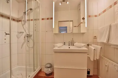 Ein Badezimmer in der Unterkunft Am Rosenhain 23 Am Rosenhain 23 Appartement 01