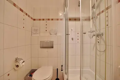 Ein Badezimmer in der Unterkunft Am Rosenhain 23 Am Rosenhain 23 Appartement 01