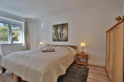 Ein Bett oder Betten in einem Zimmer der Unterkunft Wohnpark am Mühlenteich Wohnpark am Mühlenteich Appartement 05