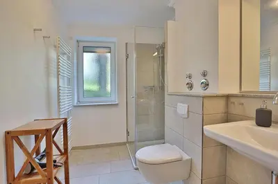 Ein Badezimmer in der Unterkunft Wohnpark am Mühlenteich Wohnpark am Mühlenteich Appartement 05
