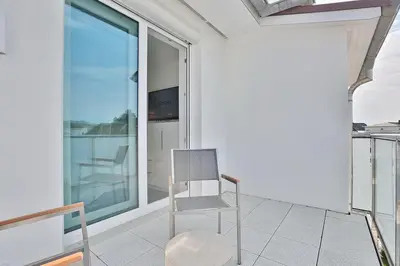 Ein Balkon oder eine Terrasse in der Unterkunft Haus Wolburgstraße 1 Haus Wolburgstraße 1a Penthouse Haifisch Appartement 5
