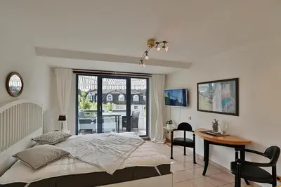 Ein Bett oder Betten in einem Zimmer der Unterkunft Ferienanlage Bergstraße 62 Ferienhaus Bergstraße 62 Appartement 19