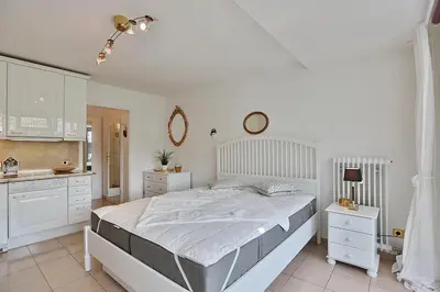 Ein Bett oder Betten in einem Zimmer der Unterkunft Ferienanlage Bergstraße 62 Ferienhaus Bergstraße 62 Appartement 19