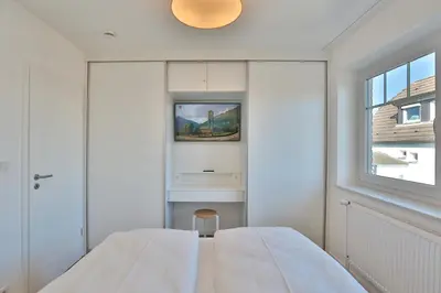 Ein Bett oder Betten in einem Zimmer der Unterkunft Bädervilla am Höppnerweg Bädervilla am Höppnerweg Appartement 10