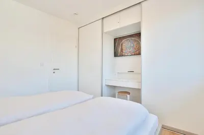 Ein Bett oder Betten in einem Zimmer der Unterkunft Bädervilla am Höppnerweg Bädervilla am Höppnerweg Appartement 10