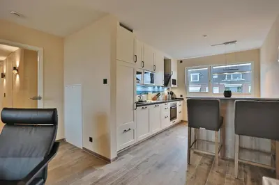 Küche/Küchenzeile in der Unterkunft Logenplatz am Kammerweg Ostseetraum Appartement 7