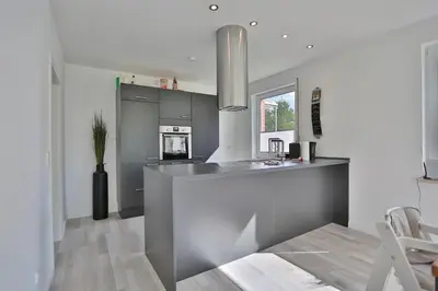 Küche/Küchenzeile in der Unterkunft Ferienhaus Glockenstraße Ferienwohnung Ostseehöhe Appartement 1