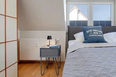 Ein Bett oder Betten in einem Zimmer der Unterkunft Haus am Seehof Seestern Appartement 3