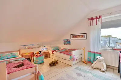 Ein Bett oder Betten in einem Zimmer der Unterkunft Haus an der Strandallee 112 Haus an der Strandallee 112 Appartement 8