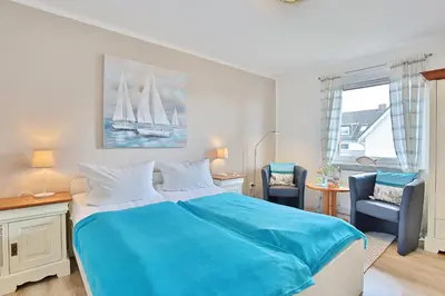 Ein Bett oder Betten in einem Zimmer der Unterkunft Ferienhaus Brandt Ferienhaus Brandt Appartement 2 Plattschnacker