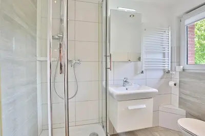 Ein Badezimmer in der Unterkunft Ferienhaus Brandt Ferienhaus Brandt Appartement 2 Plattschnacker