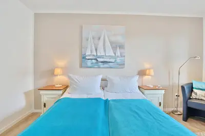 Ein Bett oder Betten in einem Zimmer der Unterkunft Ferienhaus Brandt Ferienhaus Brandt Appartement 2 Plattschnacker