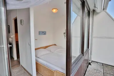 Ein Bett oder Betten in einem Zimmer der Unterkunft Terassenhügel Terrassenhügel Appartement 111