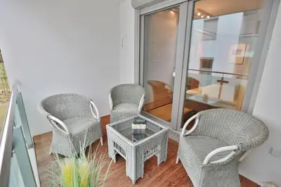 Ein Sitzbereich in der Unterkunft Dünenhaus Dünenhaus 3 Appartement 9