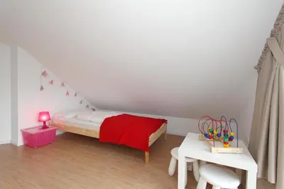Ein Bett oder Betten in einem Zimmer der Unterkunft Meerglück Meerglück Appartement 5