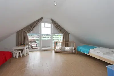 Ein Bett oder Betten in einem Zimmer der Unterkunft Meerglück Meerglück Appartement 5