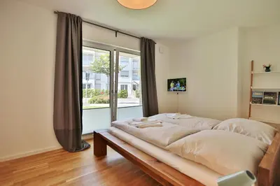 Ein Bett oder Betten in einem Zimmer der Unterkunft Ferienhaus Küstennähe Ferienhaus Küstennähe Appartement 1