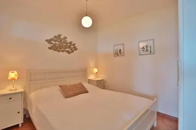 Ein Bett oder Betten in einem Zimmer der Unterkunft Residenz am Hang Residenz am Hang Appartement 205