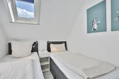 Ein Bett oder Betten in einem Zimmer der Unterkunft Haus Hansastrasse 13 Haus Hansastrasse Appartement 17