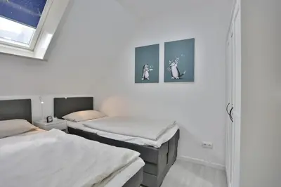 Ein Bett oder Betten in einem Zimmer der Unterkunft Haus Hansastrasse 13 Haus Hansastrasse Appartement 17