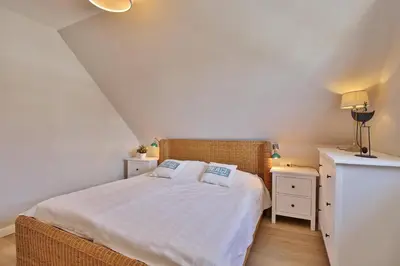 Ein Bett oder Betten in einem Zimmer der Unterkunft Am Kurpark Am Kurpark Appartement 9
