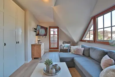 Ein Sitzbereich in der Unterkunft Am Kurpark Am Kurpark Appartement 9