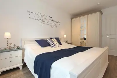 Ein Bett oder Betten in einem Zimmer der Unterkunft Kurparkresidenz Kurparkresidenz Appartement 14