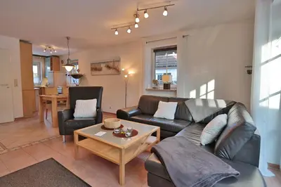 Ein Sitzbereich in der Unterkunft Ferienhaus Waldstraße Ferienhaus Waldstrasse