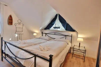 Ein Bett oder Betten in einem Zimmer der Unterkunft Ferienhaus Waldstraße Ferienhaus Waldstrasse