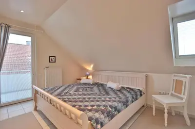 Ein Bett oder Betten in einem Zimmer der Unterkunft Residenz Seeschwalbe Residenz Seeschwalbe Appartement 5