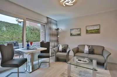 Ein Sitzbereich in der Unterkunft Haus Hansastrasse 13 Haus Hansastrasse Appartement 2
