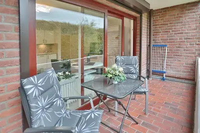 Ein Sitzbereich in der Unterkunft Haus Hansastrasse 13 Haus Hansastrasse Appartement 2