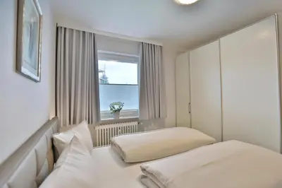Ein Bett oder Betten in einem Zimmer der Unterkunft Haus Hansastrasse 13 Haus Hansastrasse Appartement 2