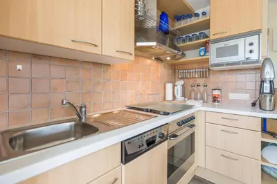 Küche/Küchenzeile in der Unterkunft Möwenberg-Residenz Möwenberg-Residenz Appartement 12 Romantiknest