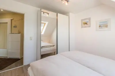 Ein Bett oder Betten in einem Zimmer der Unterkunft Möwenberg-Residenz Möwenberg-Residenz Appartement 12 Romantiknest