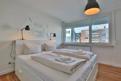Ein Bett oder Betten in einem Zimmer der Unterkunft Haus Hansastrasse 1 Haus Hansastrasse 1 Appartement 4