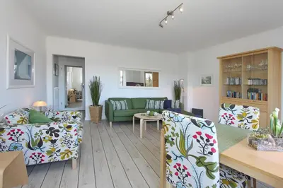 Ein Sitzbereich in der Unterkunft Haus an der Strandallee 112 Haus an der Strandallee 112 Appartement 7