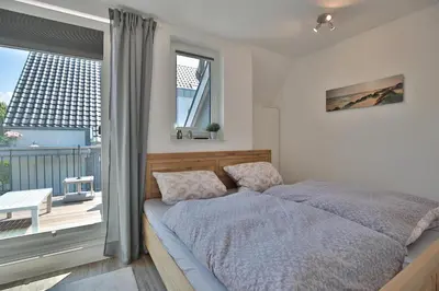 Ein Bett oder Betten in einem Zimmer der Unterkunft Bude 37 Bude 37 Appartement 6