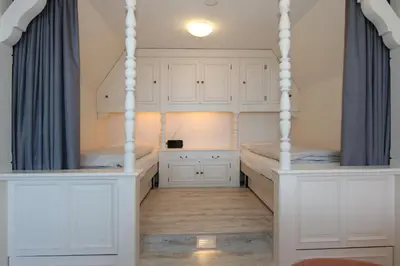 Ein Bett oder Betten in einem Zimmer der Unterkunft Hanseat am Hang 3 - 5 Hanseat am Hang 5 Appartement 12