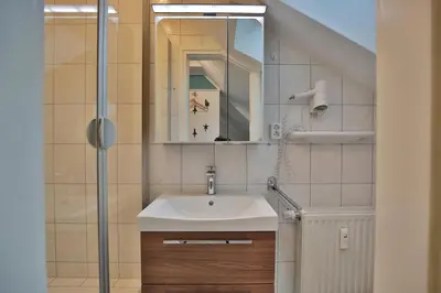 Ein Badezimmer in der Unterkunft Haus Seerose Seerose I Appartement 7