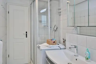 Ein Badezimmer in der Unterkunft Haus Seerose Seerose I Appartement 7