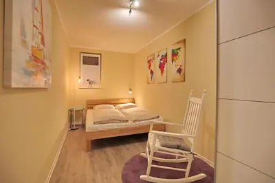 Ein Bett oder Betten in einem Zimmer der Unterkunft Bude 37 Bude 37 Appartement 2 Julia