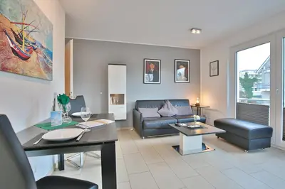 Ein Sitzbereich in der Unterkunft Strandglück Haus C Strandglück Appartement 14C