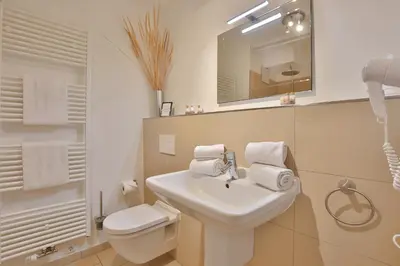 Ein Badezimmer in der Unterkunft Strandglück Haus C Strandglück Appartement 14C